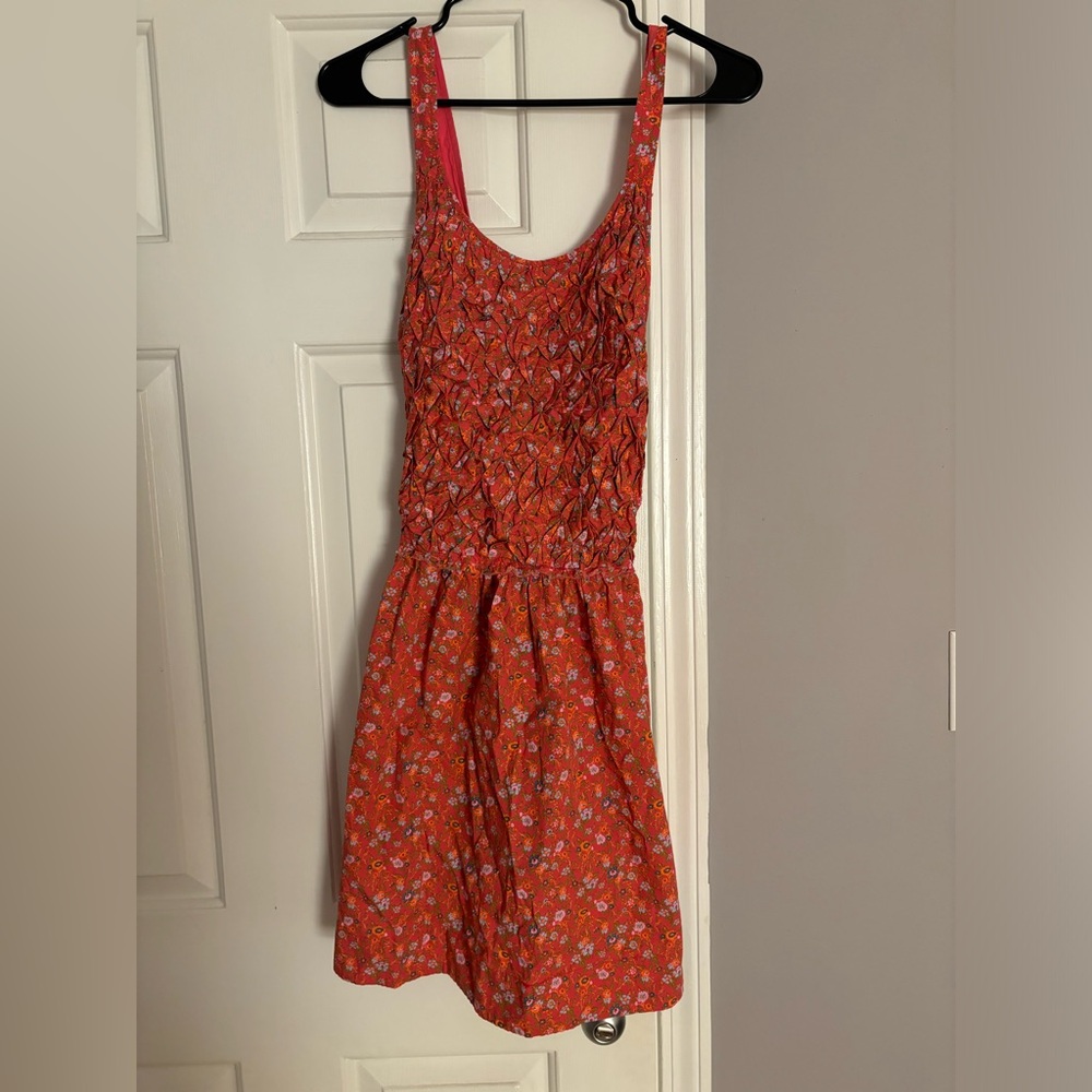 FREE PEOPLE. MEDIUM. OPEN CROSS BACK FLORAL DRESS.